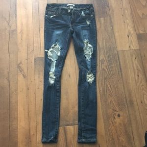 Distressed skinny jeans size 0